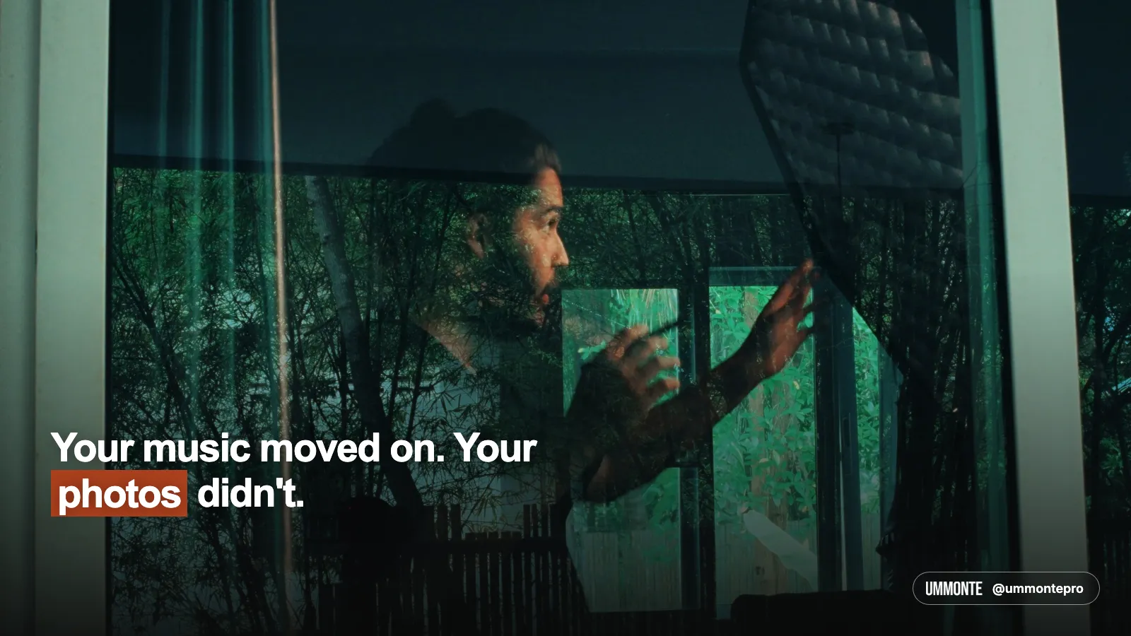 Your music moved on. Your photos didn't, in bold white type with photos highlighted in orange, over a man's reflection in a window with trees outside